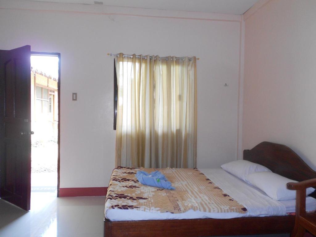 Tia Mers Guest House Пуэрто-Принцеса Номер фото